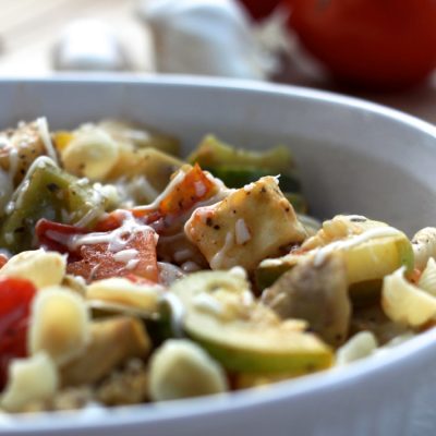 Ratatouille with Shells is a simple and tasty vegetable side dish! Leave out the pasta and cheese and it's Whole 30 approved!